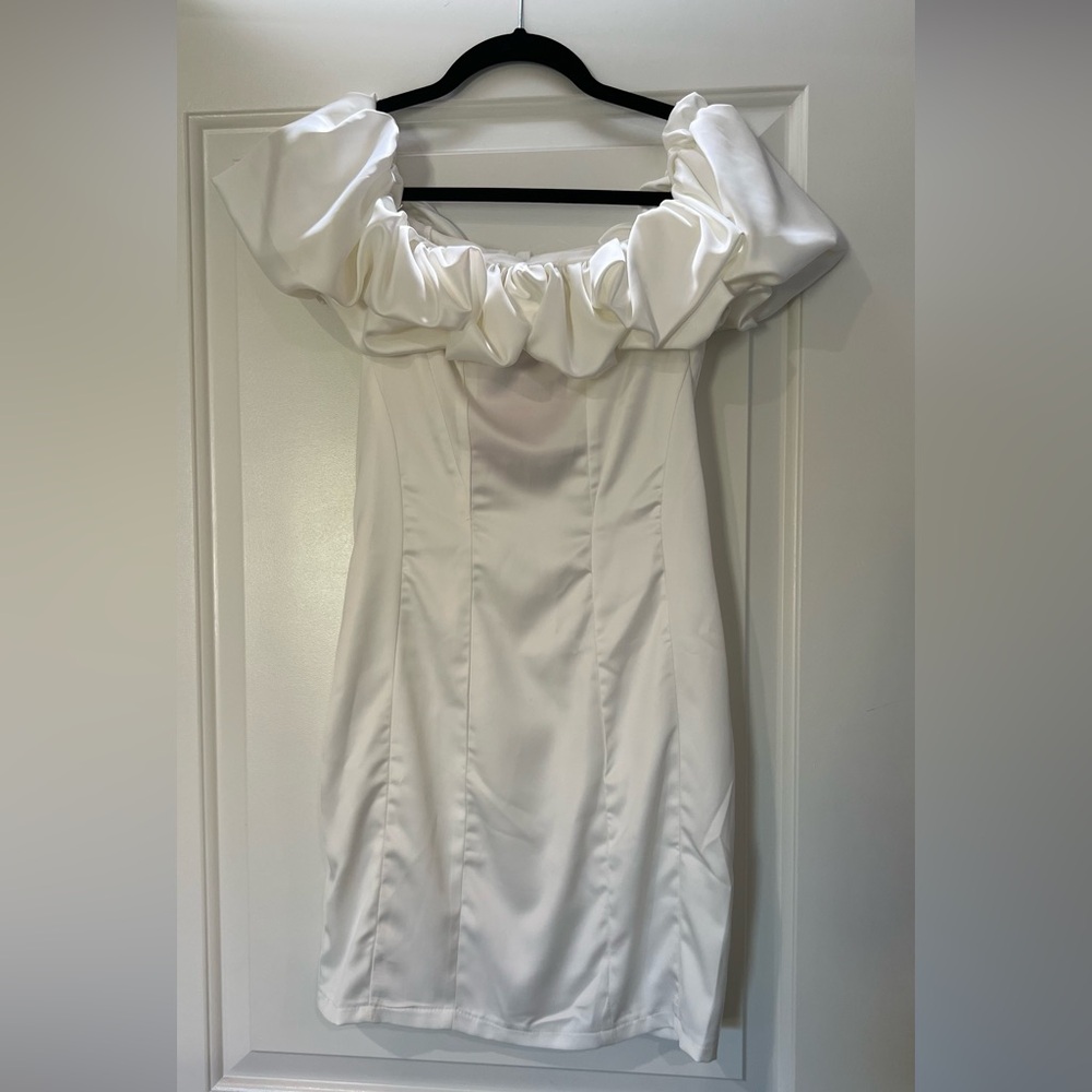 Off the shoulder white satin mini dress with big flounce